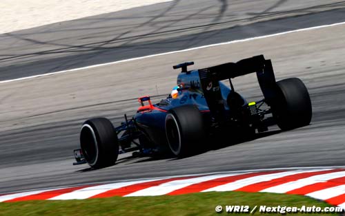 Race - Malaysian GP report: McLaren