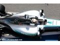 Hamilton warns Rosberg against 'momentum' hopes